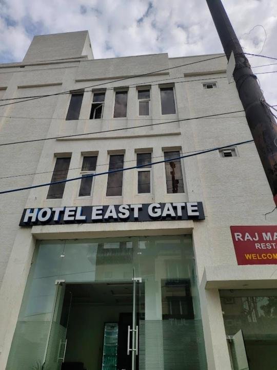 Comfortable bedding in East Gate Agra room